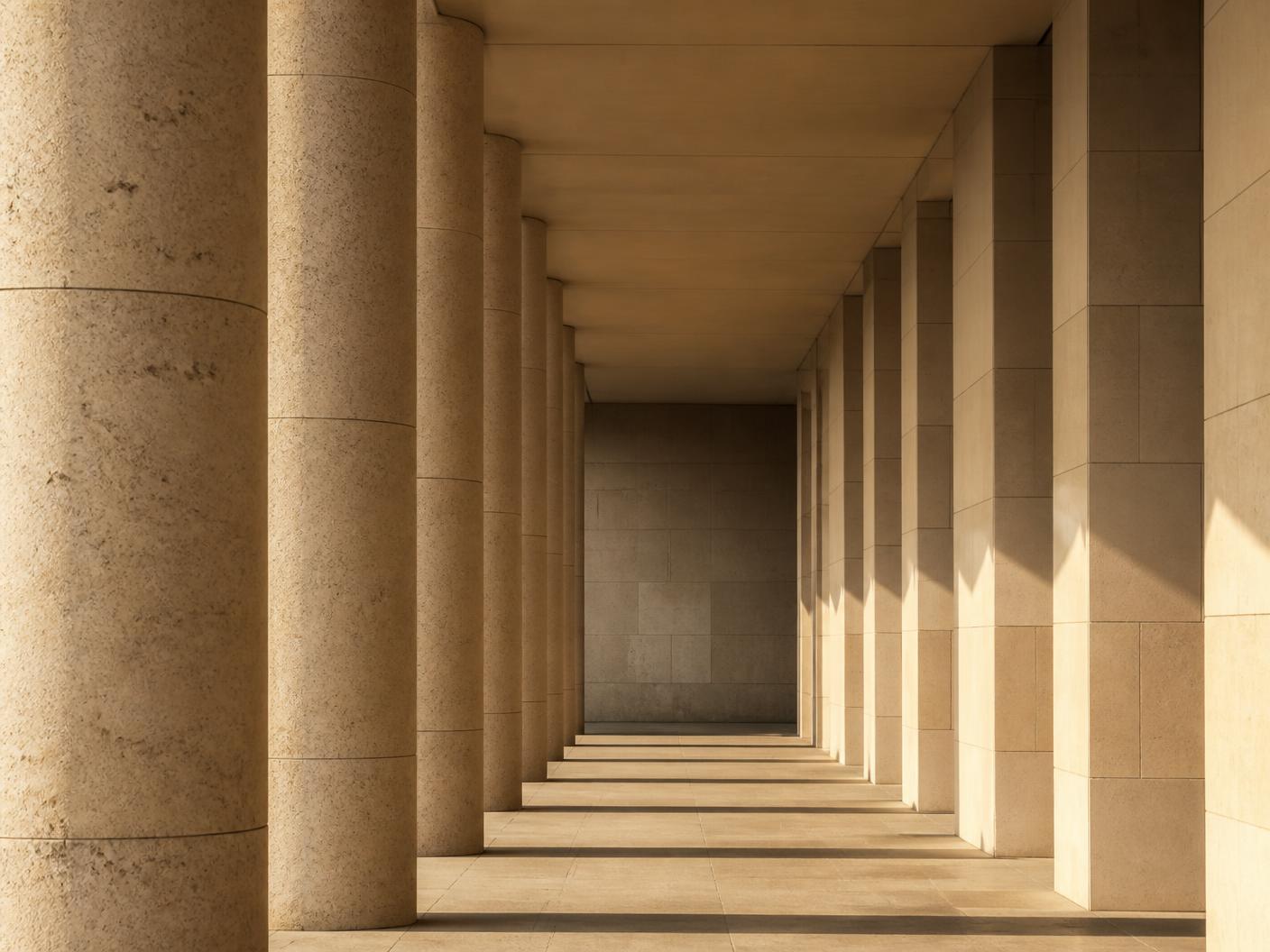 Rhythm of stone columns in warm afternoon light